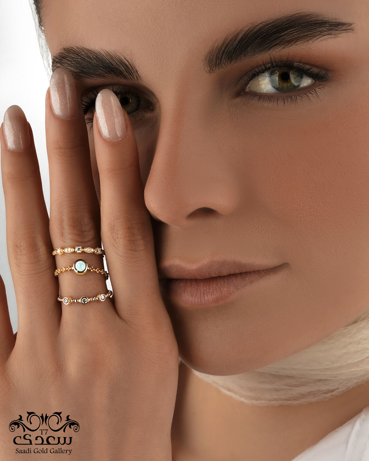 a woman with some rings on her fingers